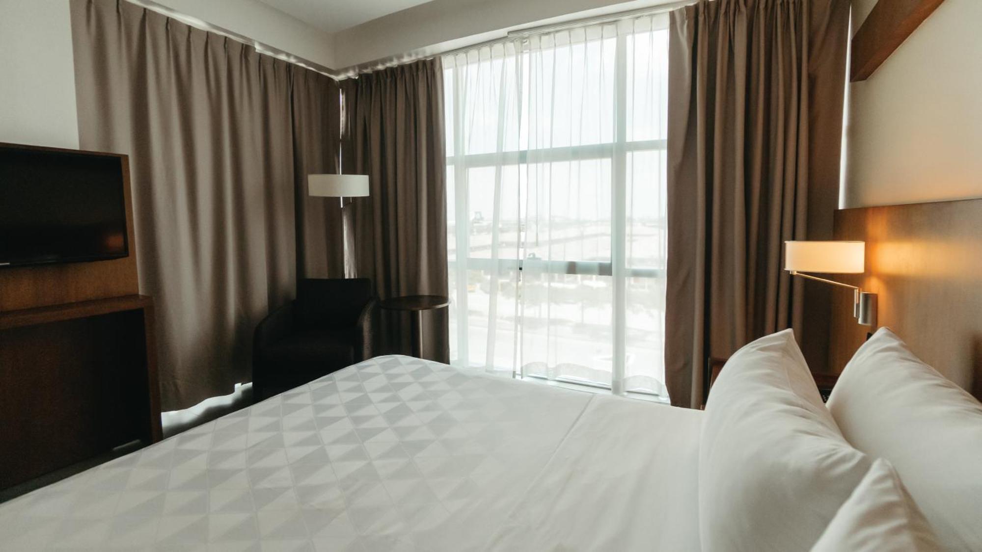 Holiday Inn Guayaquil Airport By Ihg Экстерьер фото A bedroom at the hotel